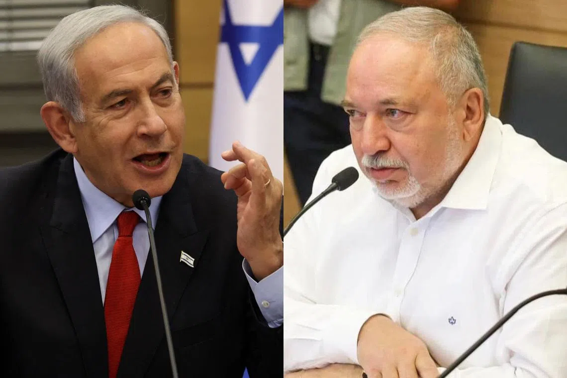 Mr Netanyahu’s Likud party said Mr Lieberman (right) had agreed to join the security Cabinet, but Mr Lieberman appeared to deny it.
