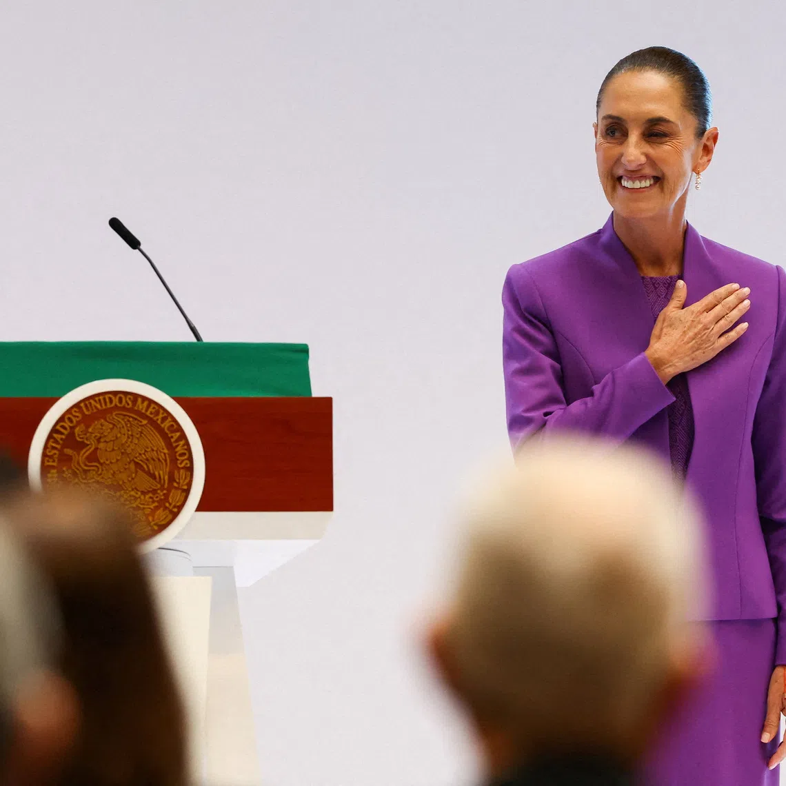 FILE PHOTO: Mexico's President Claudia Sheinbaum gestures from the stage on the day she delivers a speech marking her second year in office, in Mexico City, Mexico, September 1, 2026. REUTERS/Daniel Becerril/File Photo