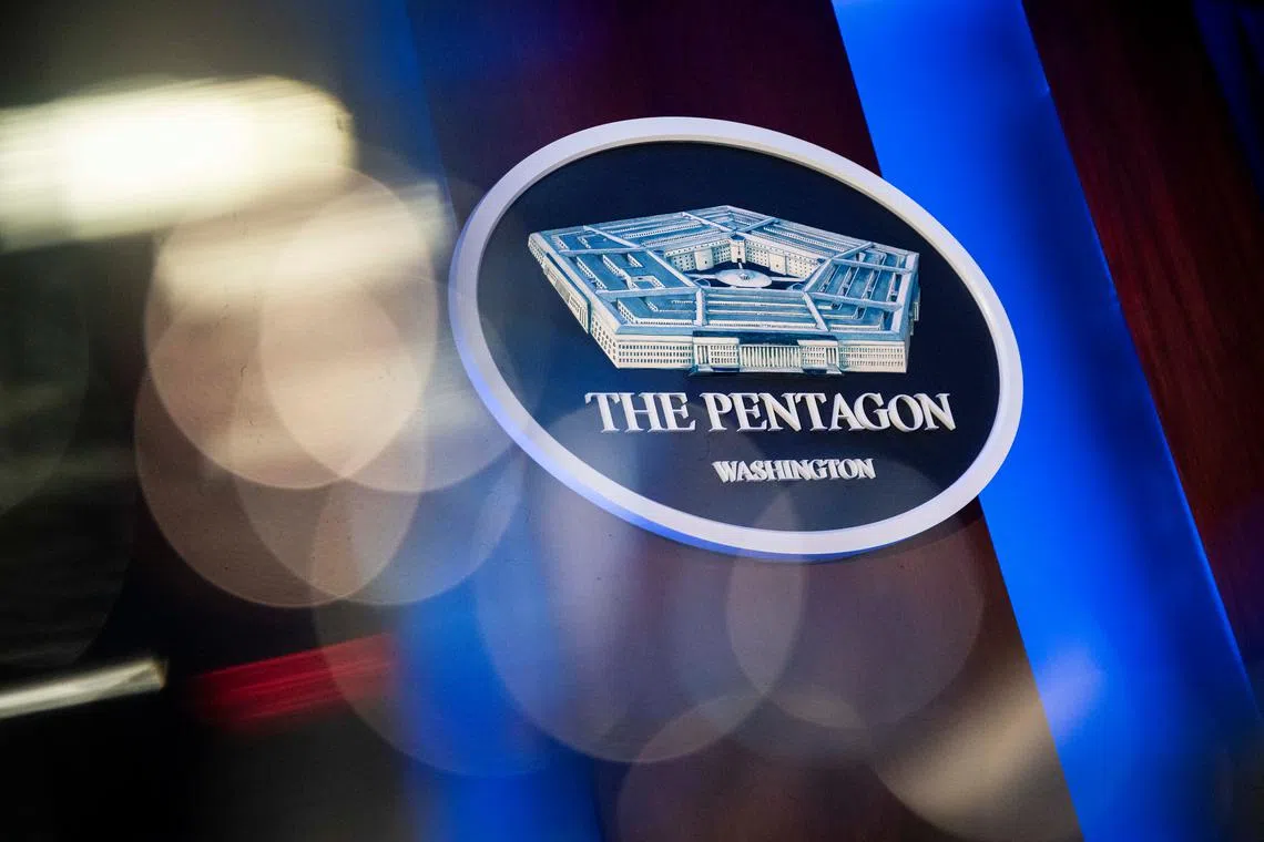 FILE PHOTO: The Pentagon logo is seen behind the podium in the briefing room at the Pentagon in Arlington, Virginia, U.S., January 8, 2020. REUTERS/Al Drago/File Photo