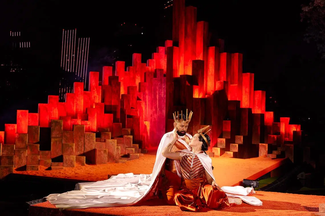 Abdul Ghafir as Macbeth and Julie Wee as Lady Macbeth in the Singapore Repertory Theatre's staging of the Scottish play at Fort Canning Park. 