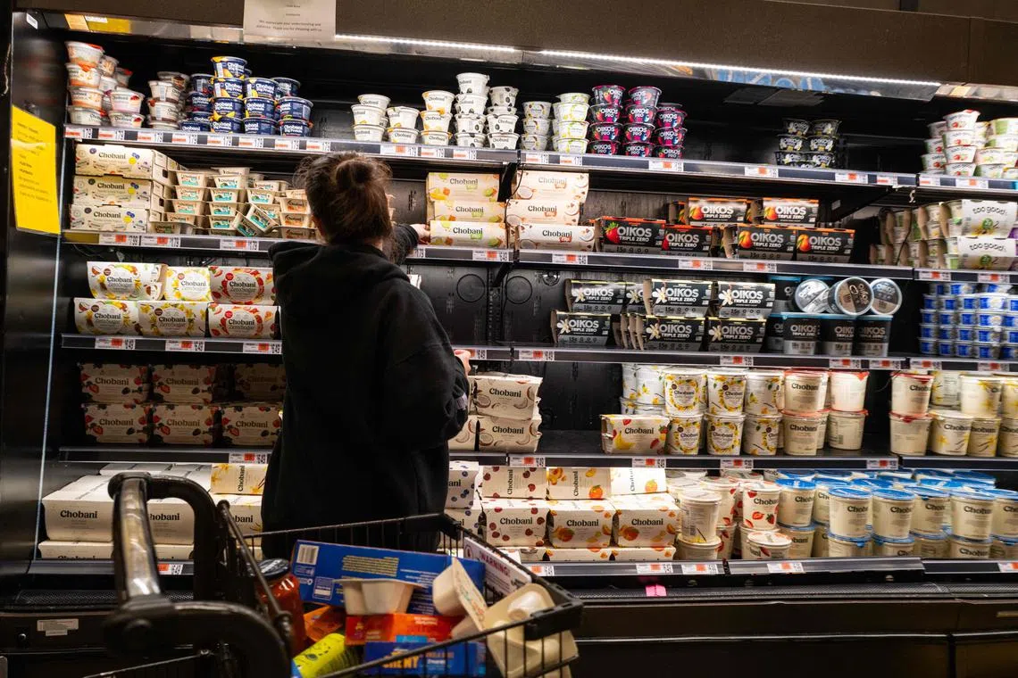 People shop at a grocery store in Brooklyn on May 13, 2025 in New York City.