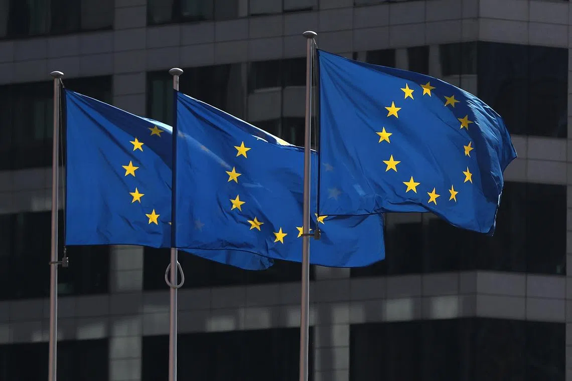 European Union flags fly outside the European Commission headquarters in Brussels, Belgium, April 10, 2019. REUTERS/Yves Herman