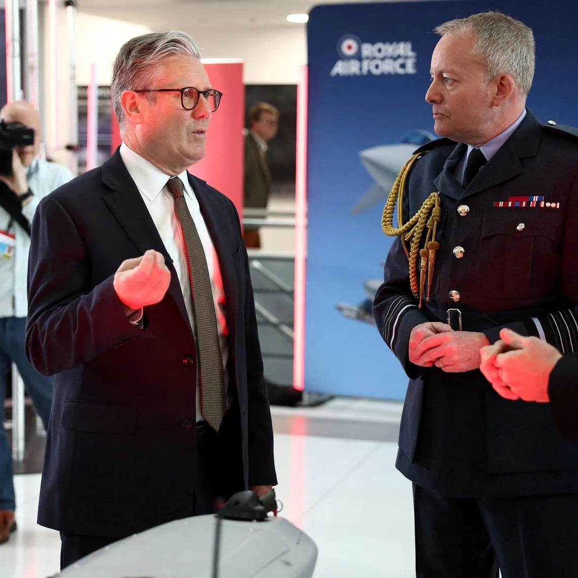 Britain's Prime Minister Keir Starmer speaks with Air Chief Marshal Richard Knighton during a visit to a defence contractor in Bedfordshire, Britain, on May 2.