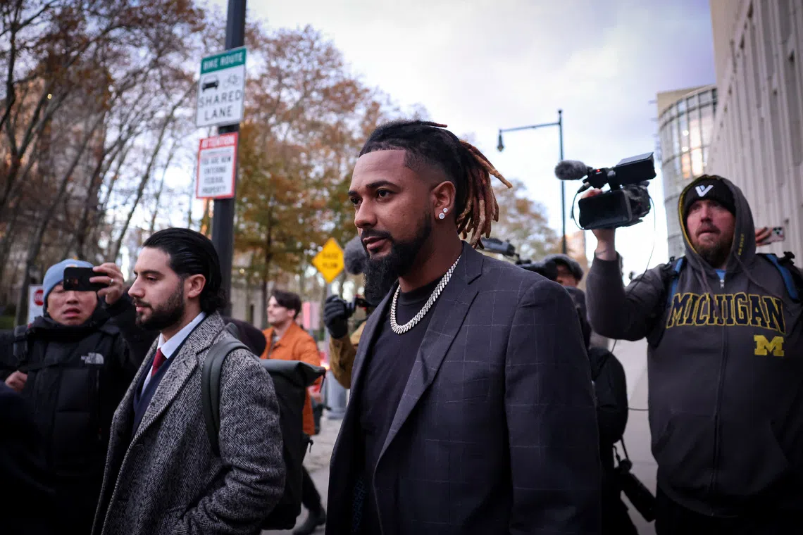 Cleveland Guardians pitcher Emmanuel Clase de la Cruz exits the Brooklyn Federal courthouse, following his arraignment on charges of sports betting and money laundering conspiracy in Major League Baseball games, in Brooklyn, New York, U.S., November 13, 2025.  REUTERS/Brendan McDermid