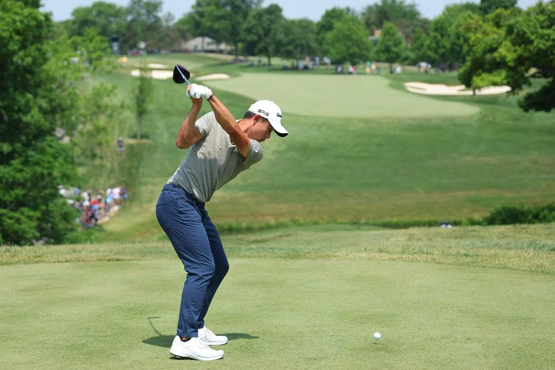 Collin Morikawa of the United States hits a tee shot on the tenth hole during the third round of the Memorial Tournament.