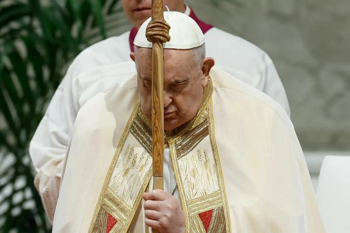 FILE PHOTO: Pope Francis celebrates Mass for members of institutes of consecrated life and societies of apostolic life, in St. Peter's Basilica at the Vatican, February 2, 2024. REUTERS/Remo Casilli/File Photo