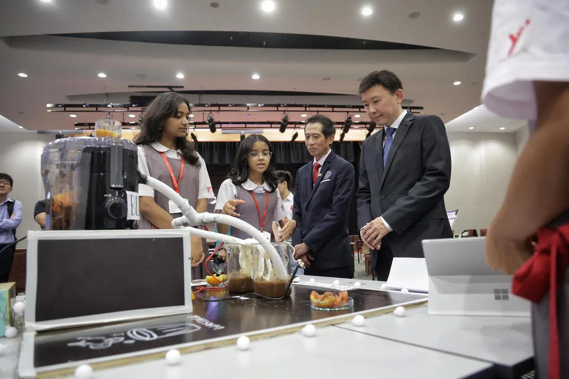 Transport Minister Chee Hong Tat, accompanied by IES president Chan Ewe Jin (second from right), listening to an introduction by students from Yuvabharathi International School on their project Wastage To Voltage during a National Engineers Day event organised by the Institution of Engineers, Singapore (IES) at ITE College Central on July 13, 2024.

The IES will also be launching a new scholarship fund, which will support needy and deserving tertiary students in pursuing an engineering education to bolster Singapore’s engineering talent and drive future growth.