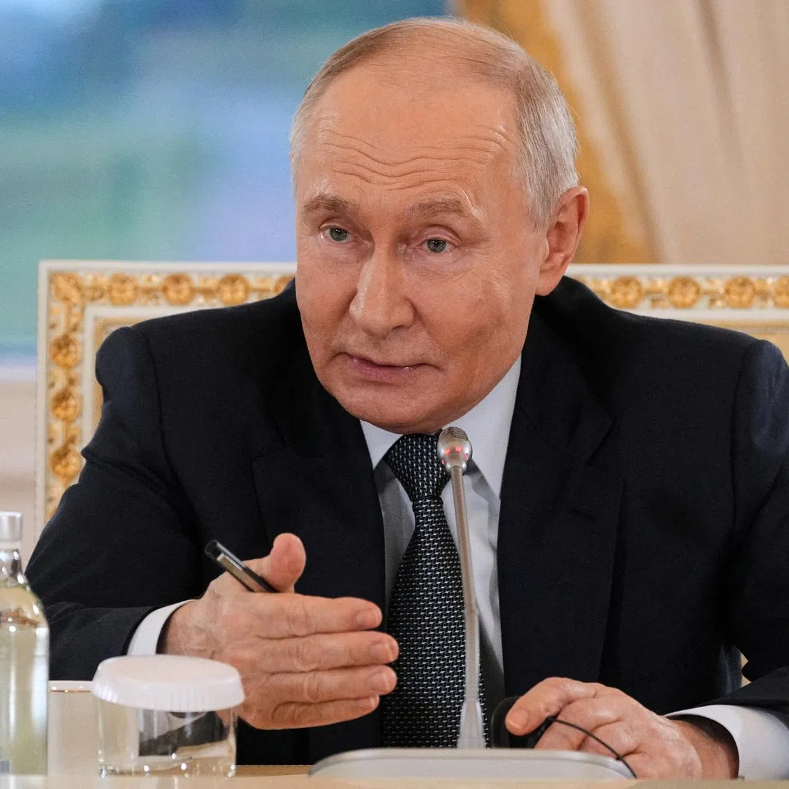 FILE PHOTO: Russian President Vladimir Putin speaks to representatives of international news agencies on the sidelines of the St. Petersburg International Economic Forum, at the Constantine Palace in St. Petersburg, Russia, June 4, 2026.  Dmitri Lovetsky/Pool via REUTERS/File Photo