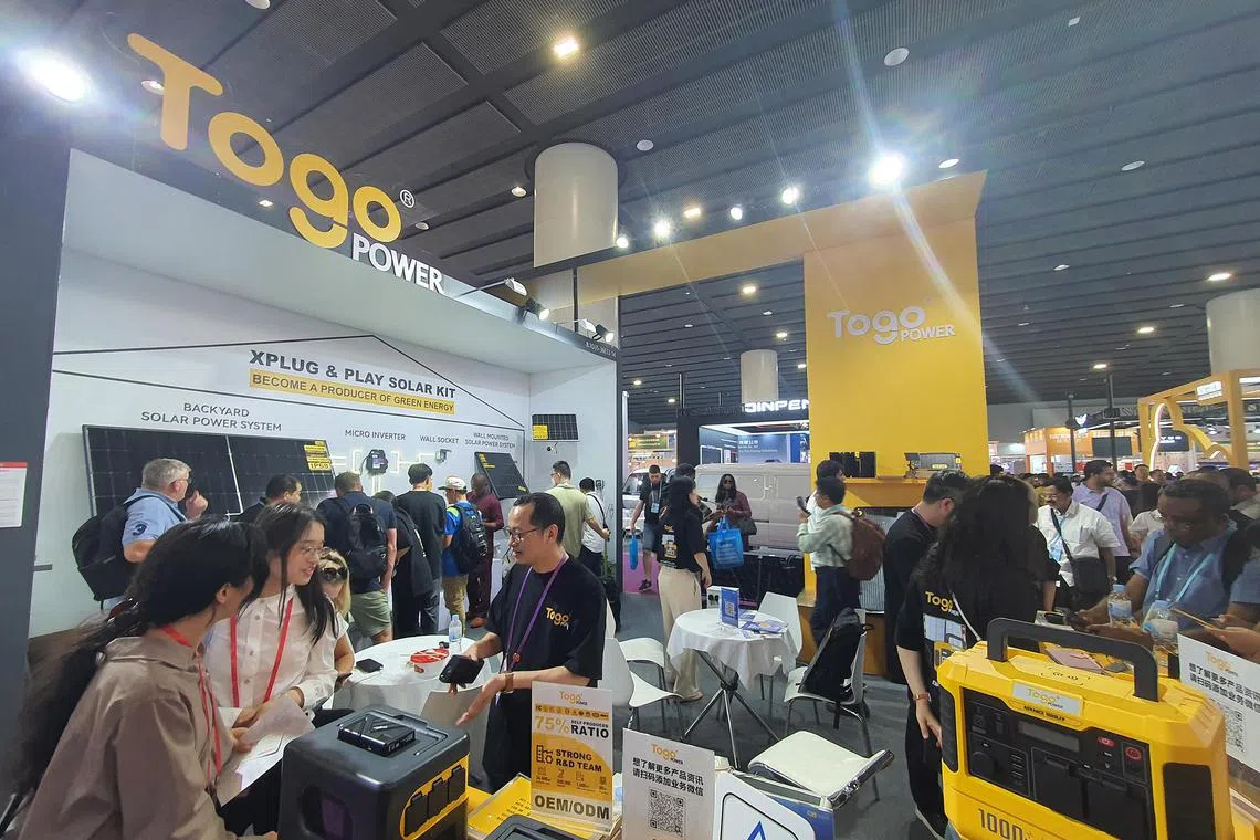 jycanton - Buyers looking at the backyard solar power system, portable lithium batteries and other offerings from Fujian's Skytimes Energy, whose products are displayed under the name of its distributor.

Credit: Joyce ZK Lim