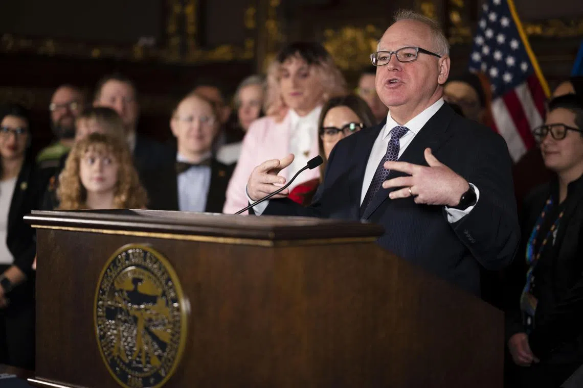 Governor Tim Walz speaks before signing an executive order to protect access to medical care for transgender people at the Minnesota State Capitol on March 8, 2023.