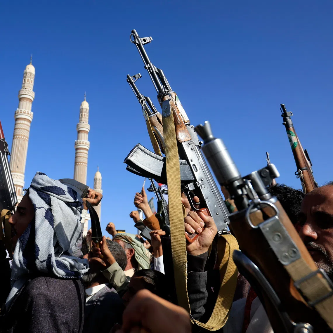 Houthi supporters hold up weapons during a protest against Saudi Arabia, in Sanaa, Yemen, on Oct 9.