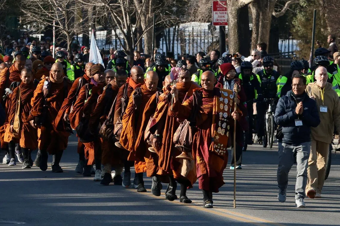 Venerable Bhikkhu Pannakara leads a group of Buddhist monks on the 3,700km Walk For Peace.