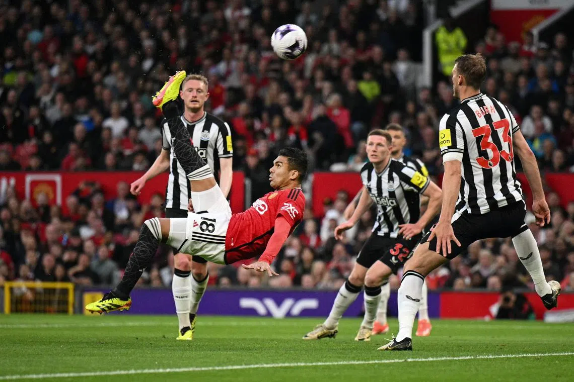 Manchester United midfielder Casemiro attempting an overhead kick during an English Premier League match against Newcastle United. There is a possibility that such clashes could be staged overseas in the future.