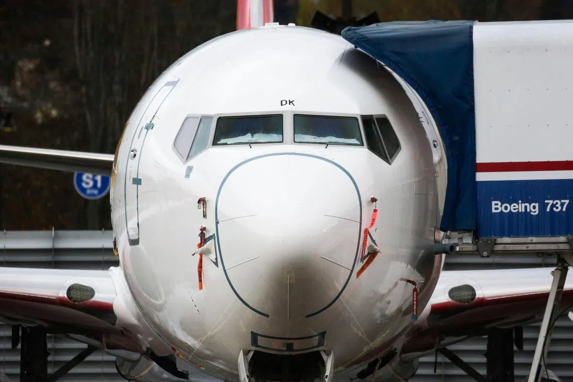 (FILES) A Boeing 737 MAX airliner at the Boeing Factory in Renton, Washington on November 18, 2020. Troubled aviation giant Boeing reported a first-quarter loss of $343 million on April 24, 2024, reflecting recent safety troubles that have slowed production and deliveries. Boeing said it tempered production in the 737 program following a January near-catastrophic incident on an Alaska Airlines jet. The company is implementing a "comprehensive action plan" following a federal audit of the program, Boeing said. (Photo by Jason Redmond / AFP)