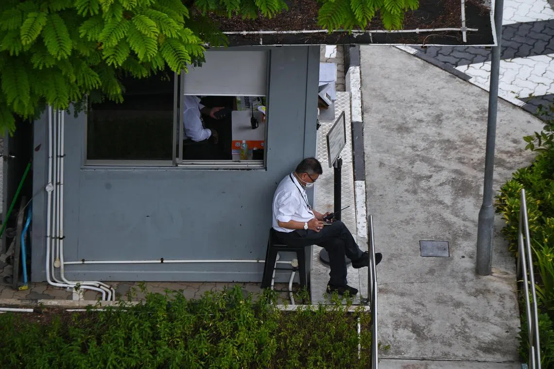 ST20211102_202112064811 Kua Chee Siong/ pixgeneric/ Generic pix of a security guard sitting next to the guard house of the Pathlight School in Ang Mo Kio on 2 Nov 2021.