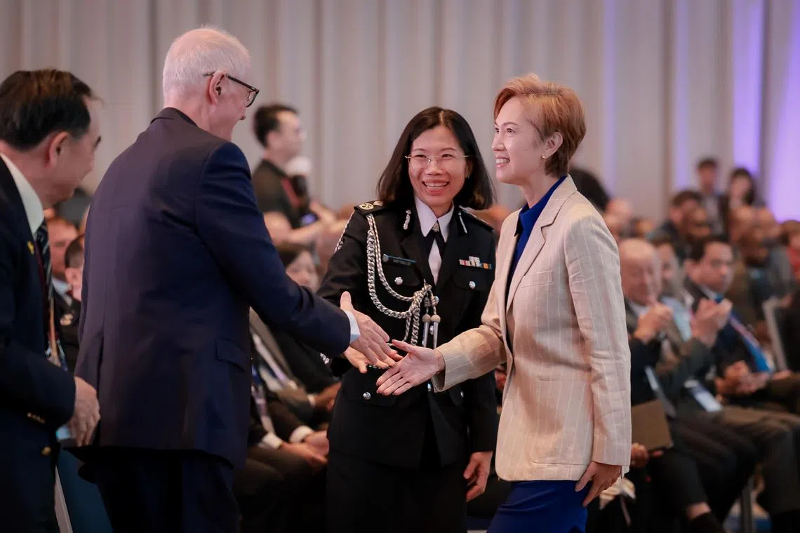 Second Minister for Home Affairs Josephine Teo (right) with ICPA president Peter Severin (left) and Commissioner of Prisons Shie Yong Lee at the ICPA Annual Conference opening ceremony on Sept 2.