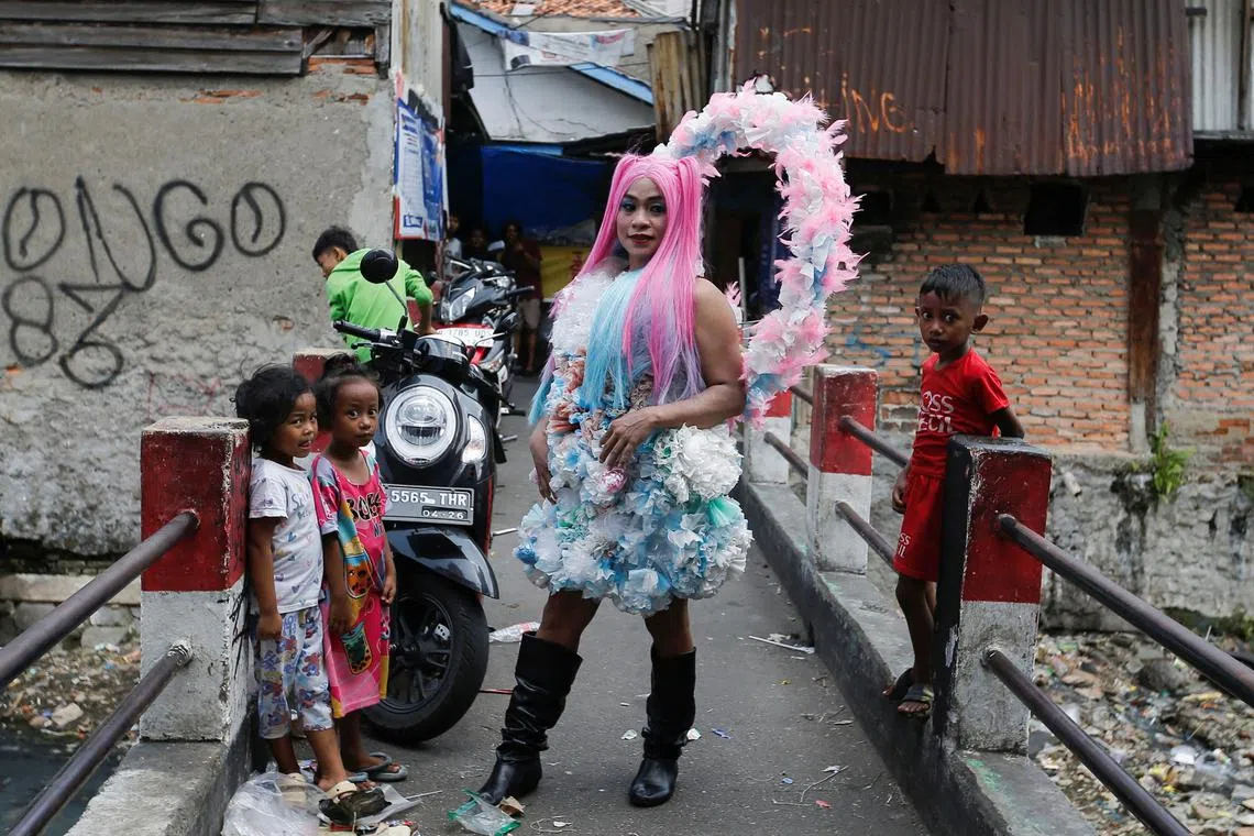 FILE PHOTO: Agustina, 41, a trans woman poses before a Trans Super Heroes fashion show at a traditional market in Jakarta, Indonesia, December 17, 2023. REUTERS/Ajeng Dinar Ulfiana/File Photo