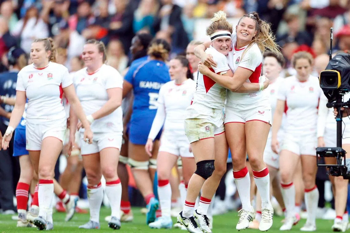 Rugby - Women's World Cup 2025 - Semi Finals - France v England - Ashton Gate, Bristol, Britain - September 20, 2025 England's Megan Jones and Jess Breach celebrate after the match Action Images via Reuters/Peter Cziborra