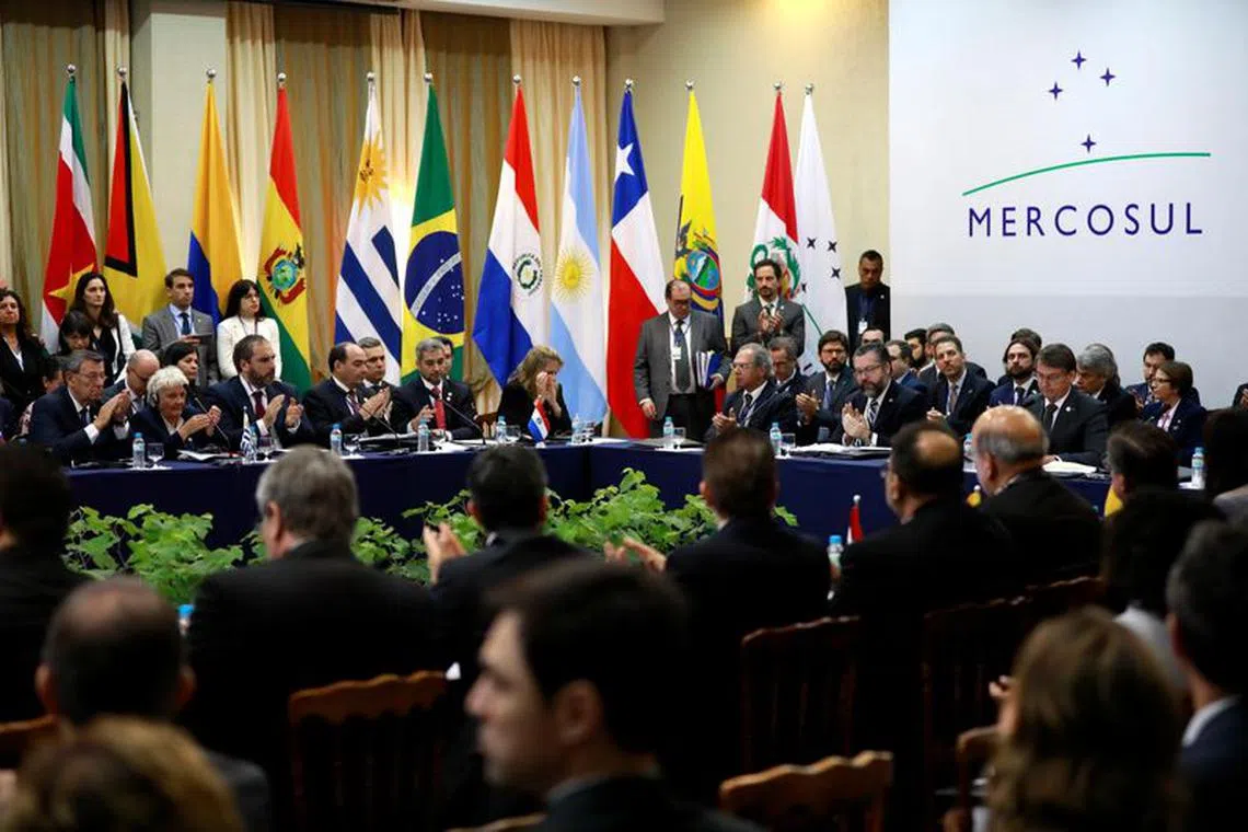 Brazil's President Jair Bolsonaro, Uruguay's Vice President Lucia Topolansky, Paraguay's President Mario Abdo Benitez, and Chile's Foreign Minister Teodoro Ribera attend a Mercosur trade bloc summit, in Bento Goncalves, Brazil December 5, 2019. REUTERS/Diego Vara/File Photo
