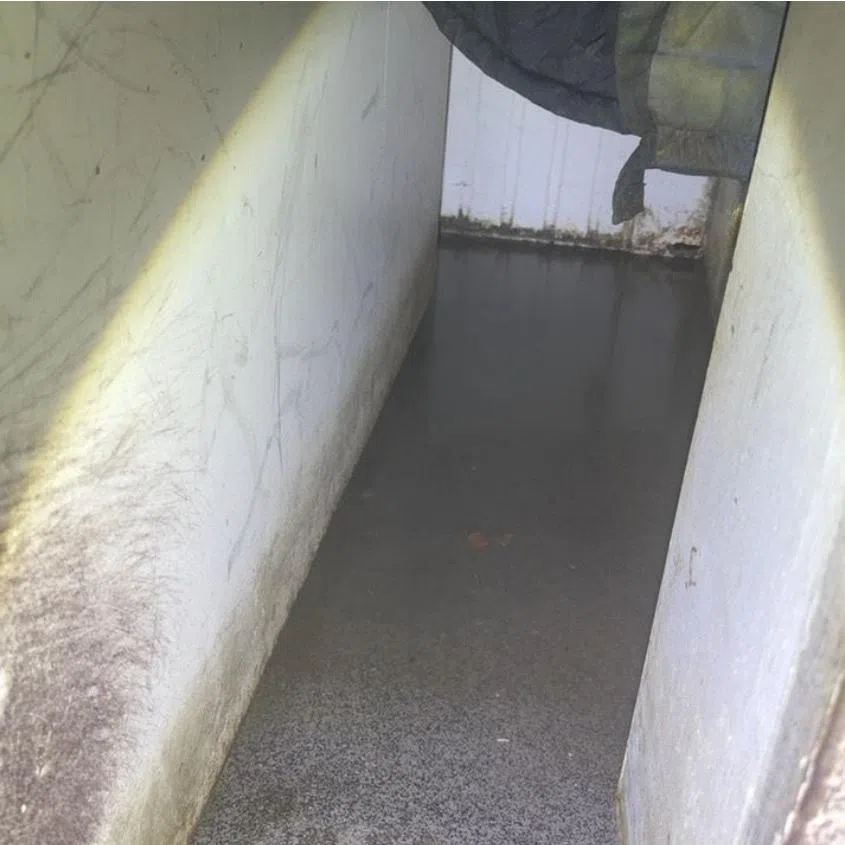 Food safety lapses identified during a joint inspection of Stamford Catering’s premises include stagnant water found outside a walk-in chiller (left) and a dirty food warmer.