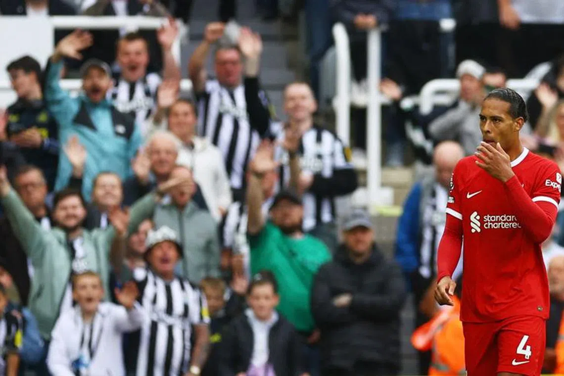 Soccer Football - Premier League - Newcastle United v Liverpool - St James' Park, Newcastle, Britain - August 27, 2023 Liverpool's Virgil van Dijk walks off the pitch after he is shown a red card by referee John Brooks Action Images via Reuters/Lee Smith