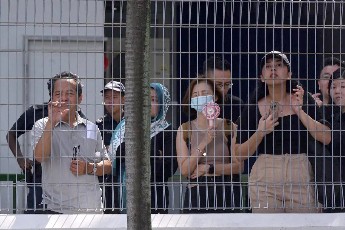Supporters gathering along the carpark at Jalan Besar Stadium looking into the nomination centre at PA.