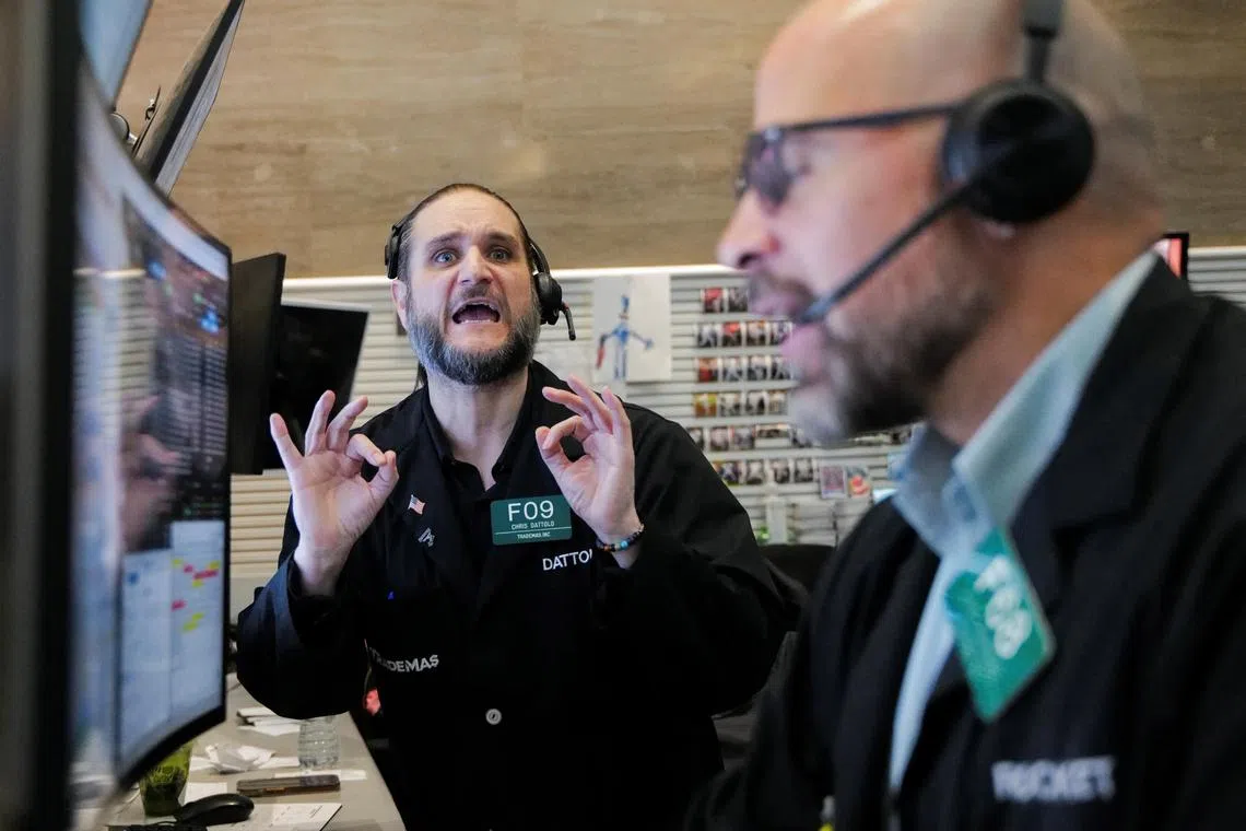 Futures-options traders working on the floor at NYSE American, at the New York Stock Exchange, on April 10.