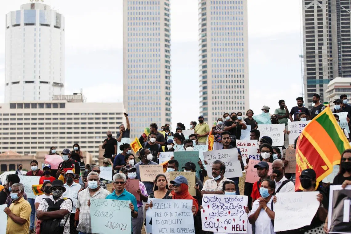 Demonstrators holding placards attend a protest to demand justice for the April 2019 Easter Sunday bomb attack, on the third anniversary of this attack, near the Presidential Secretariat, amid the country's economic crisis, in Colombo, Sri Lanka, April 17, 2022. REUTERS/Navesh Chitrakar