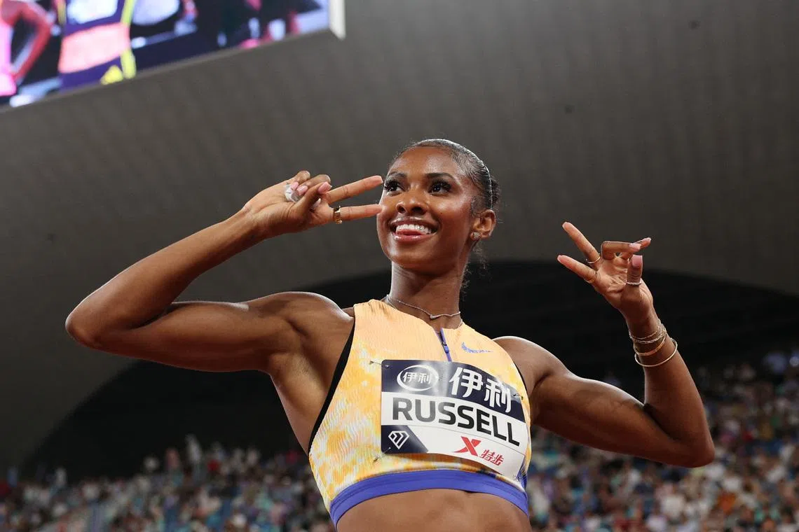 Athletics - Diamond League - Xiamen - Xiamen Egret Stadium, Xiamen, China - May 23, 2026 Masai Russell of the U.S. celebrates after winning the women's 100m hurdles REUTERS/Go Nakamura