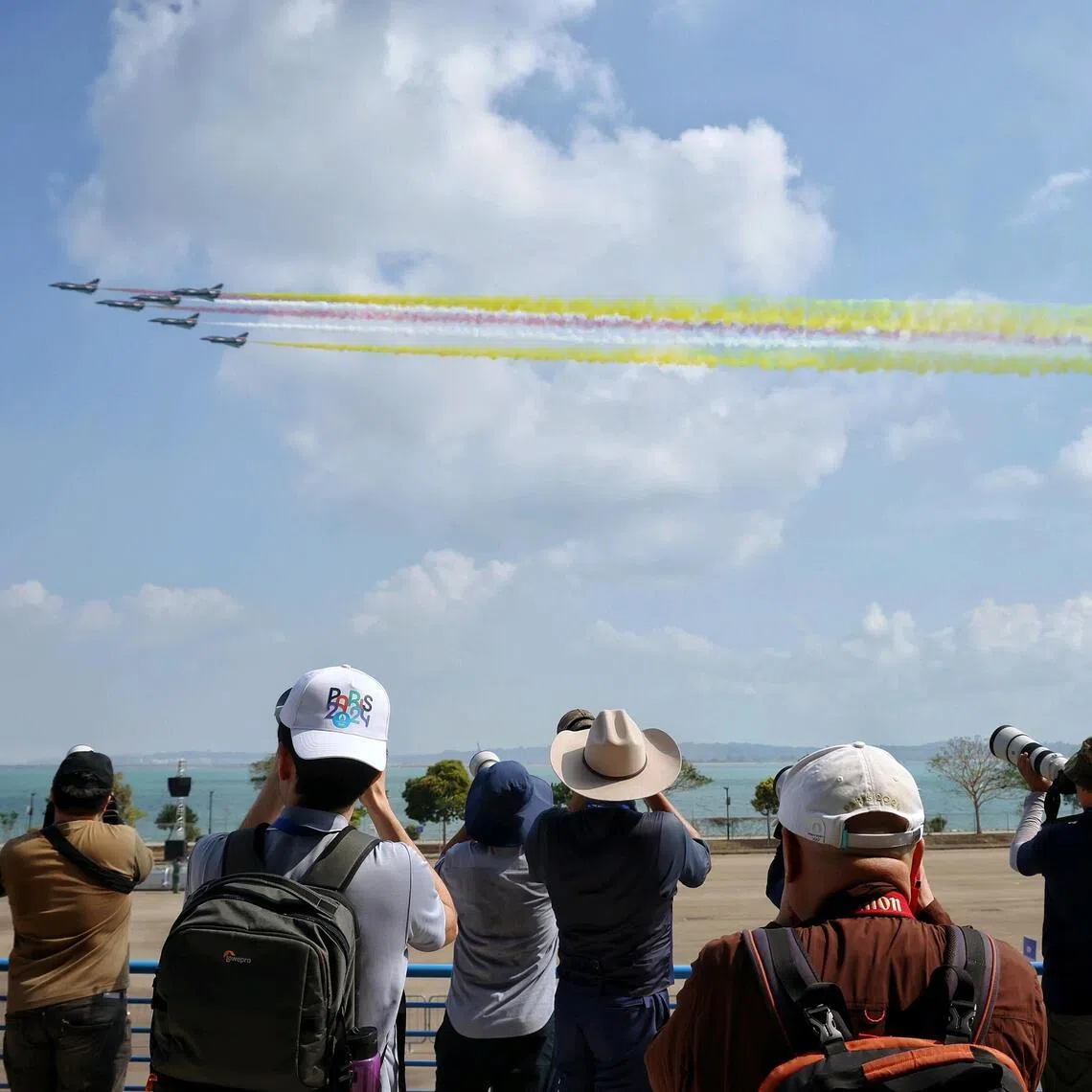 A display of team aerobatics by the J-10 combat aircrafts from the People's Liberation Army Air Force Bayi Aerobatic Team during the media preview at Changi Exhibition Centre on Feb 1, 2026. ST PHOTO: KEVIN LIM esair01