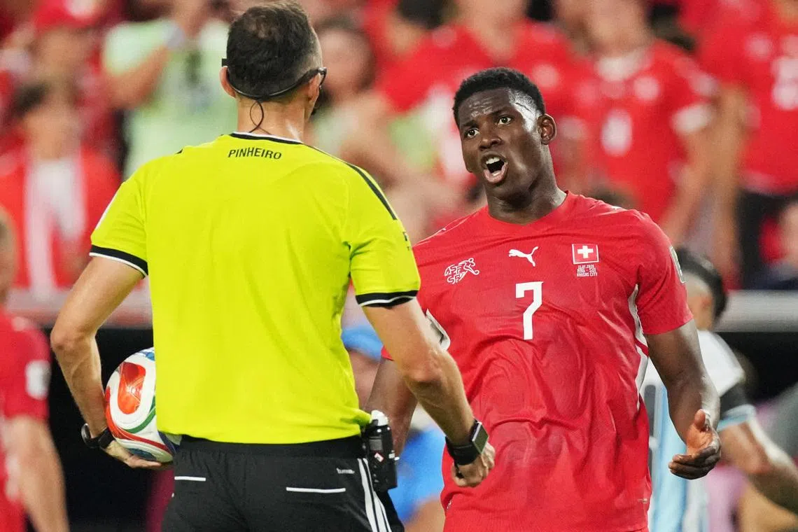 Soccer Football - FIFA World Cup 2026 - Quarter Final - Argentina v Switzerland - Kansas City Stadium, Kansas City, Missouri, U.S. - July 11, 2026 Switzerland's Breel Embolo remonstrates with referee Joao Pedro Silva Pinheiro IMAGN IMAGES via Reuters/Denny Medley