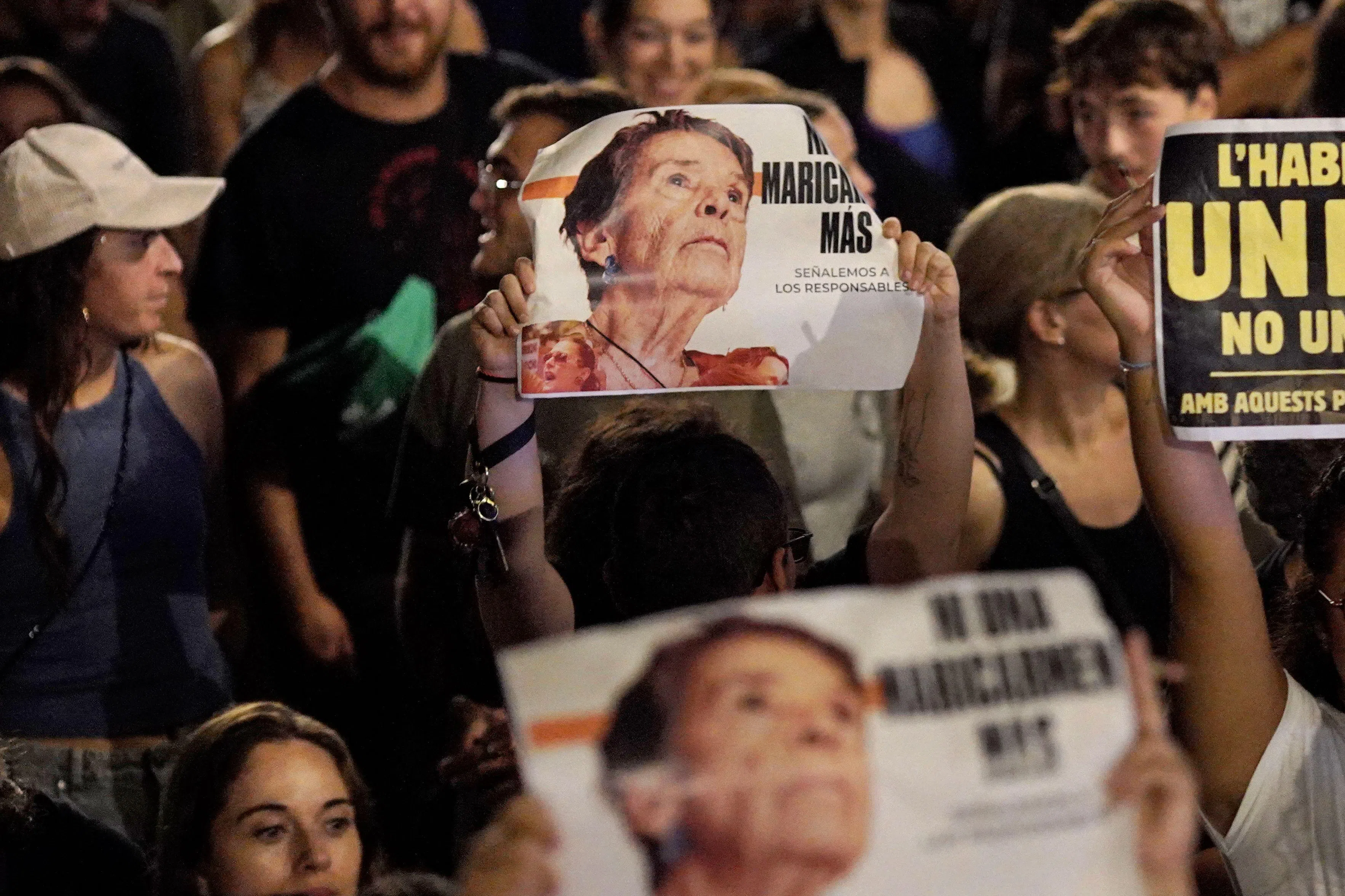 Demonstrators in Barcelona on Oct 5 holding signs that read “Not a single more Maricarmen”, in reference to Maricarmen Abascal, a pensioner evicted from her Madrid home after 71 years of living there.
