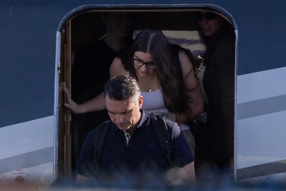 FILE PHOTO: Brazilian Senator Flavio Bolsonaro disembarks from a plane after arriving at Opa-locka Executive Airport near Miami, Florida, US, October 28, 2026. REUTERS/Eva Marie Uzcategui/File Photo
