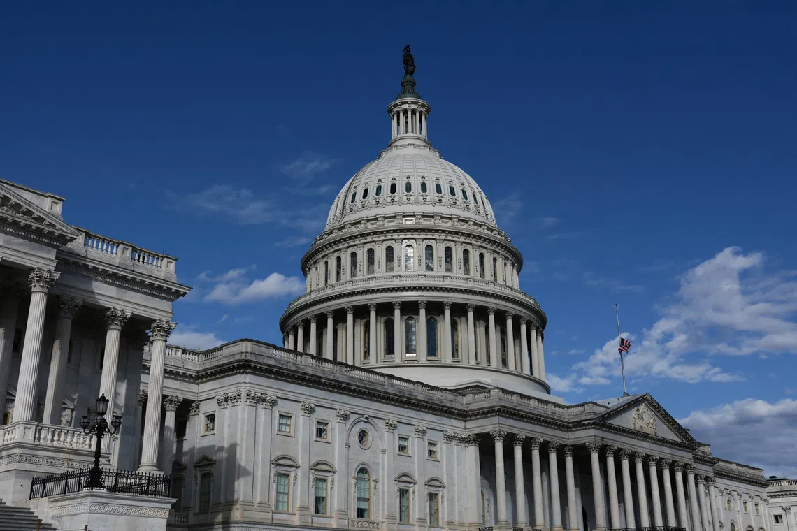 FILE PHOTO: The U.S. Capitol building after the U.S. Senate advances a bill to end the government shutdown in Washington, D.C., U.S.,  November 10, 2025. REUTERS/Evelyn Hockstein/File Photo