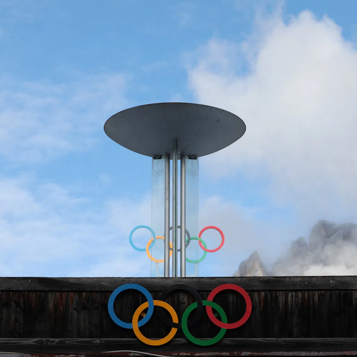 A general view of the Olympic brazier in front of the Stadio Olimpico del Ghiaccio ahead of Milano Cortina Winter Olympics 2026, in Cortina d’Ampezzo, Italy, December 5, 2025. REUTERS/Claudia Greco