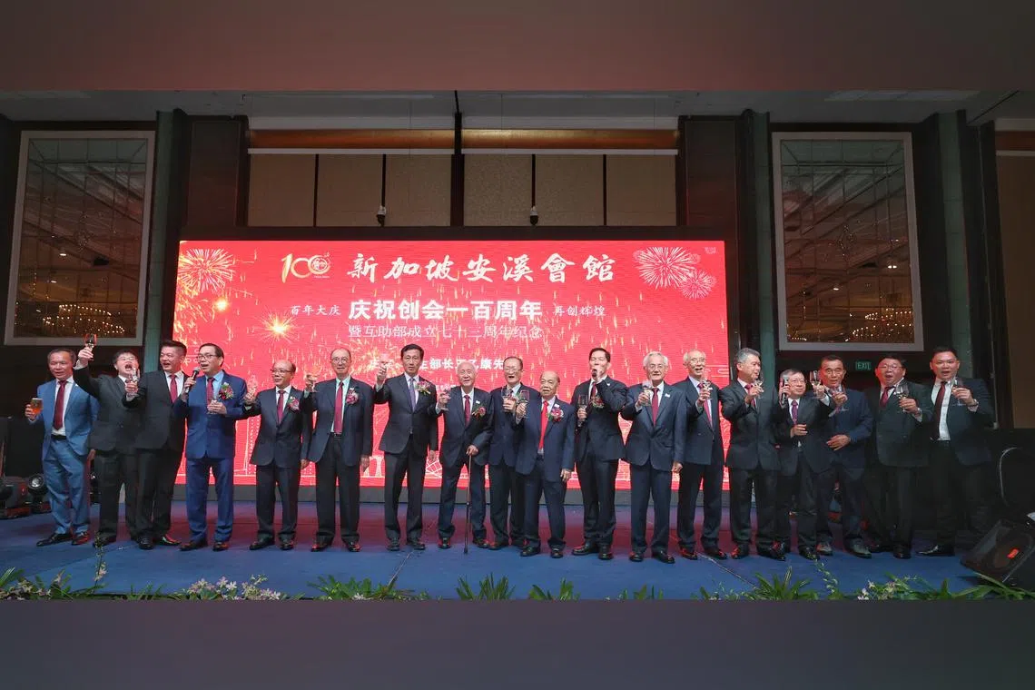 Health Minister Ong Ye Kung (seventh from left) at the 100th anniversary dinner of Singapore Ann Kway Association on Monday.