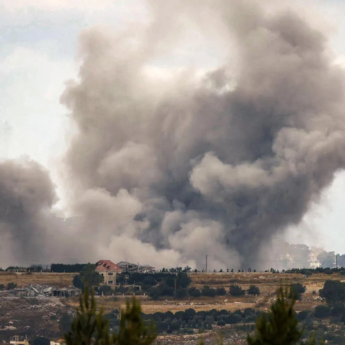 Smoke rises from an Israeli bombardment near the village of Kfar Tibnit in southern Lebanon on June 14, 2026.
