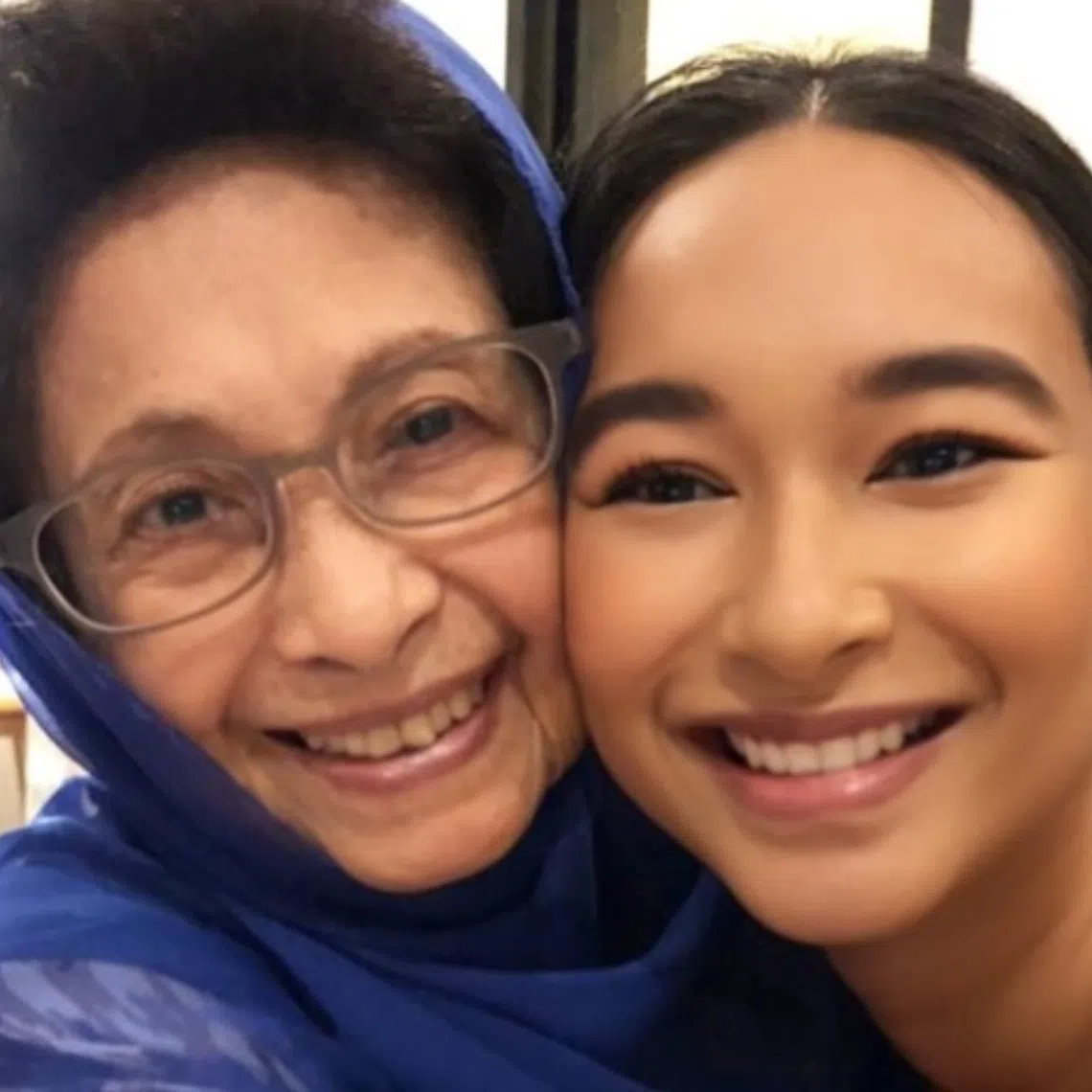 Ally Mukhriz (right) expressed deep grief over the loss of Siti Hasmah Mohamad Ali whom she affectionately called “Tok.”
