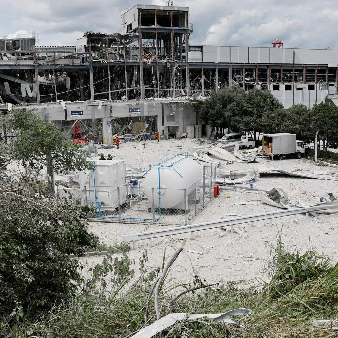 Debris is strewn at the damaged Aeon Mall shopping centre, where an explosion occurred after an earthquake with 7.1 magnitude struck Japan’s southern Kumamoto prefecture on July 29.