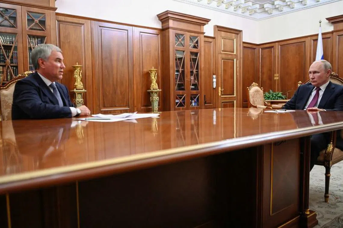 Russian President Vladimir Putin and State Duma Chairman Vyacheslav Volodin attend a meeting at the Kremlin in Moscow, Russia July 31, 2023. Sputnik/Alexander Kazakov/Kremlin via REUTERS/ File Photo