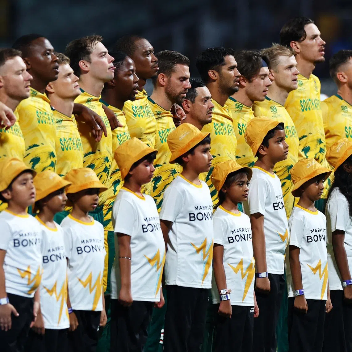 Cricket - ICC Men's T20 World Cup 2026 - Semi Final - South Africa v New Zealand - Eden Gardens, Kolkata, India - March 4, 2026 South Africa players line up during the national anthems before the match REUTERS/Anushree Fadnavis