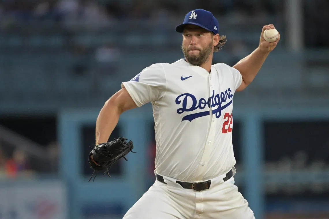 FILE PHOTO: Aug 6, 2024; Los Angeles, California, USA;  Los Angeles Dodgers starting pitcher Clayton Kershaw (22) delivers to the plate in the third inning against the Philadelphia Phillies at Dodger Stadium. Mandatory Credit: Jayne Kamin-Oncea-USA TODAY Sports/File Photo