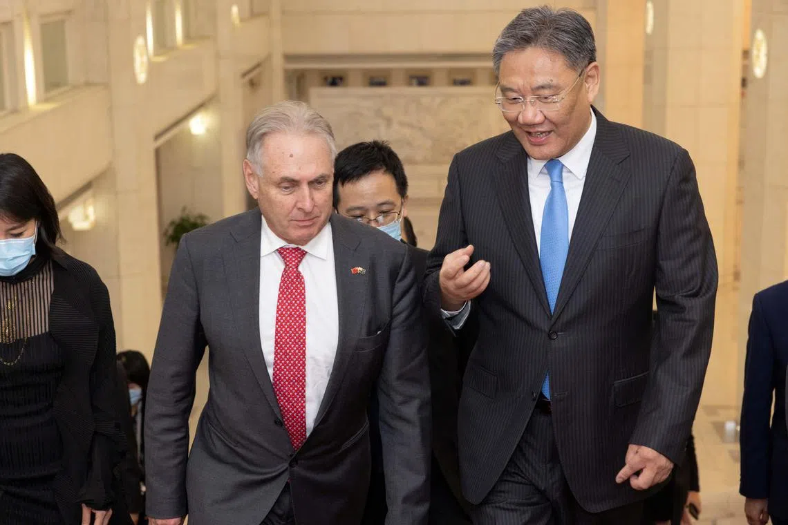 Australia’s Minister for Trade and Tourism Don Farrell and China’s Commerce Minister Wang Wentao in Beijing on May 12.
