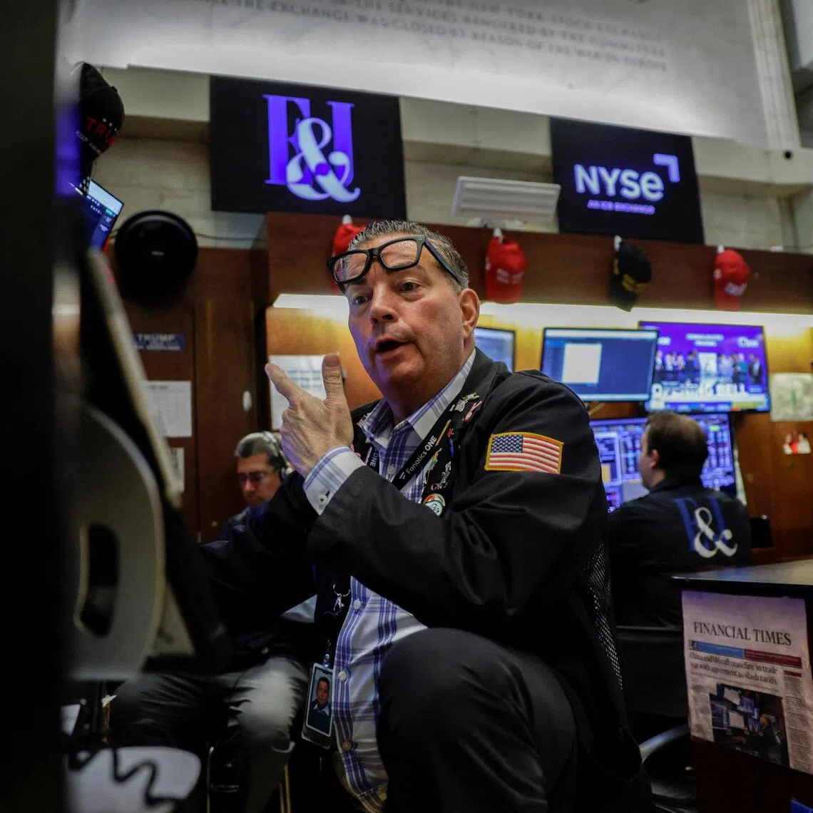 A trader working on the floor of the New York Stock Exchange in New York City on Aug 5.
