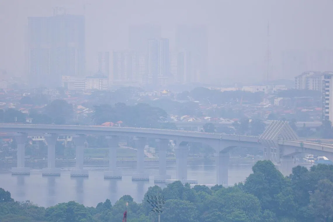 The RTS link bridge shrouded in haze, as seen from Urbanville@Woodlands at around 12:50pm on Oct 18, 2026.