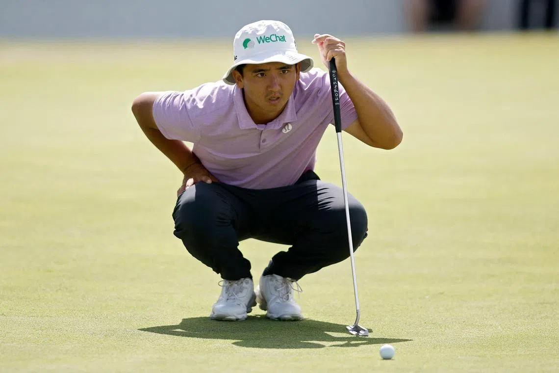 Dou Zecheng of China lining up a putt on the 18th green during the third round of the AT&T Byron Nelson at TPC Craig Ranch on Saturday. 