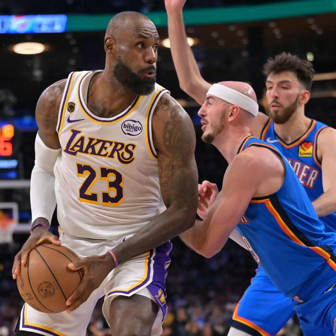 LeBron James in action against Oklahoma City Thunder guard Alex Caruso and center Chet Holmgren during the 2026 NBA Play-offs at the Los Angeles Lakers’ Crypto.com Arena on May 9.
