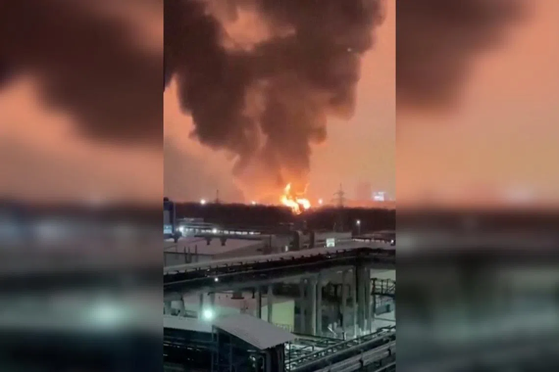 A screen grab from a social media video showing smoke and flames rising from the site of an attack in Kazan, Russia, on Jan 14.