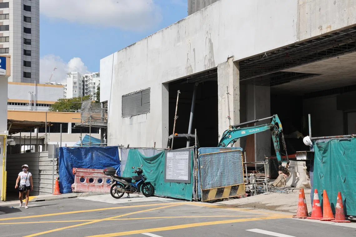 The car plowed into two parked motorcycles before crashing into a fence at a construction site near Block 82 Marine Parade Central.