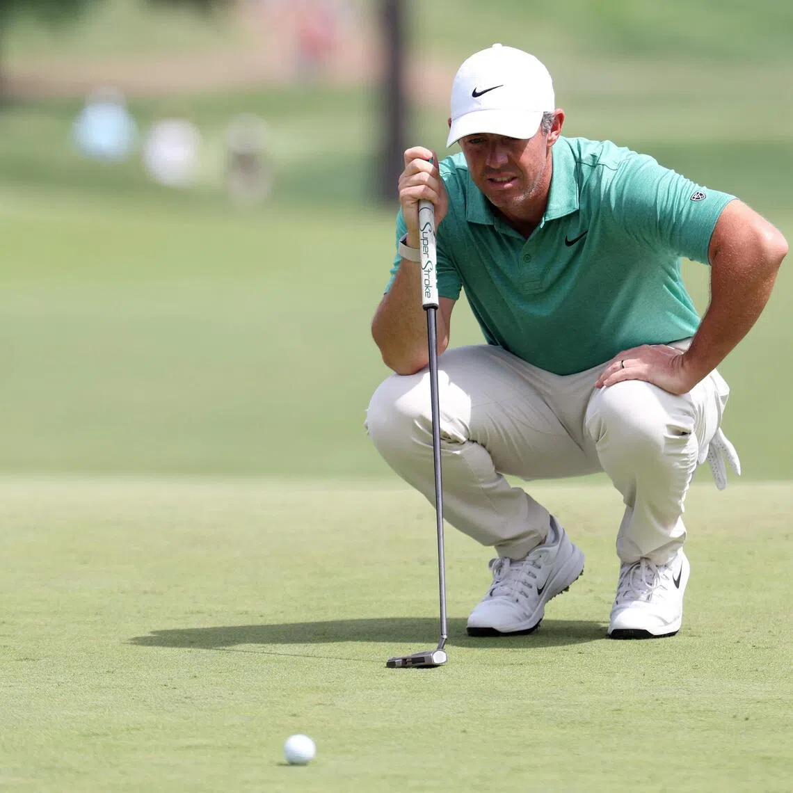 Rory McIlroy of Northern Ireland lines up a putt on the seventh green during the final round of the 2026 BMW Championship.